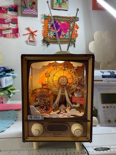 Photo du montage partagée : Puzzle 3D boîte à musique carnaval au coucher du soleil