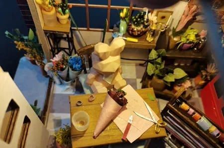 Photo du montage partagée : Maquette en bois boutique de fleurs miniature